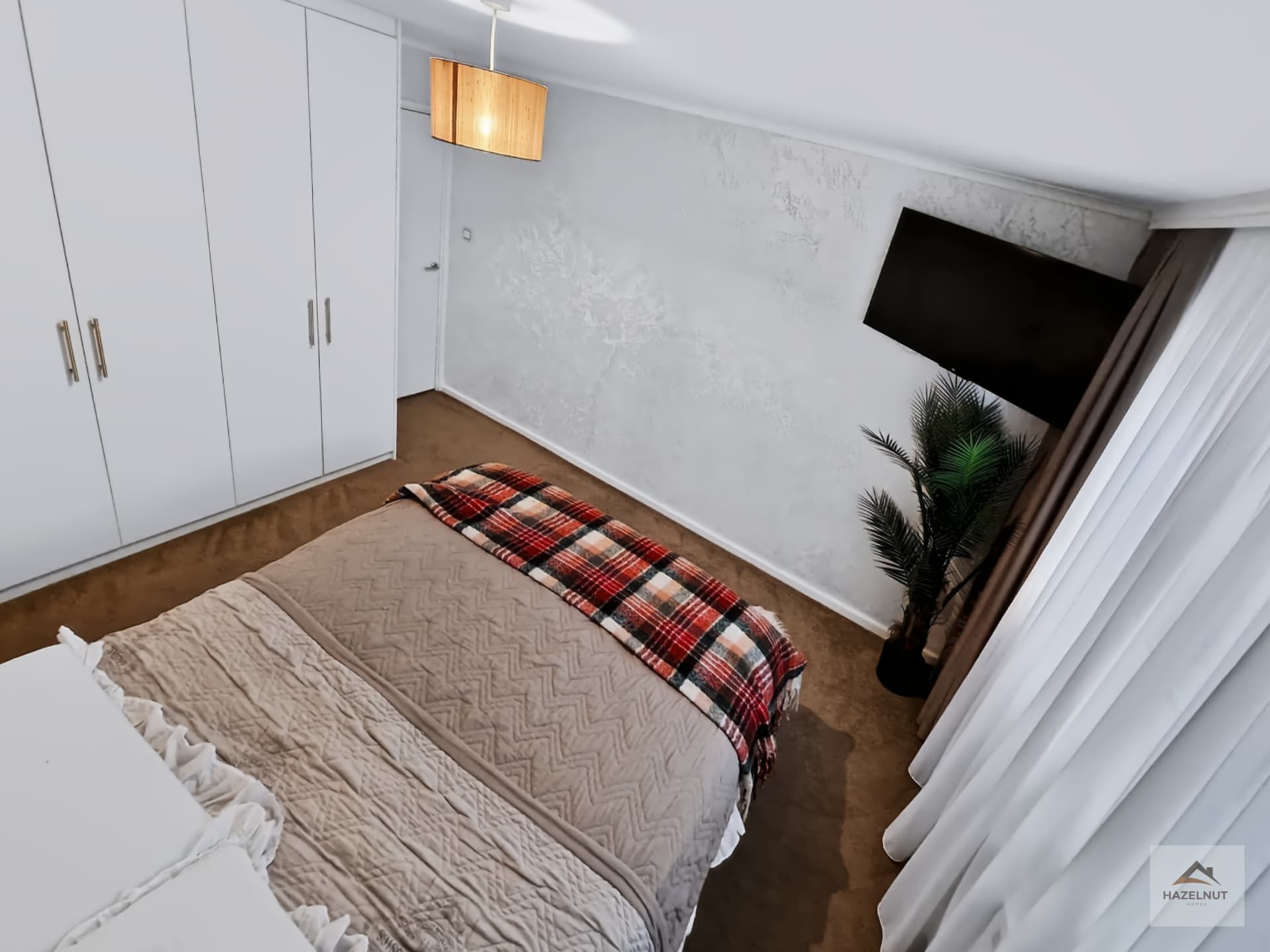 Spacious double bedroom with built-in wardrobes