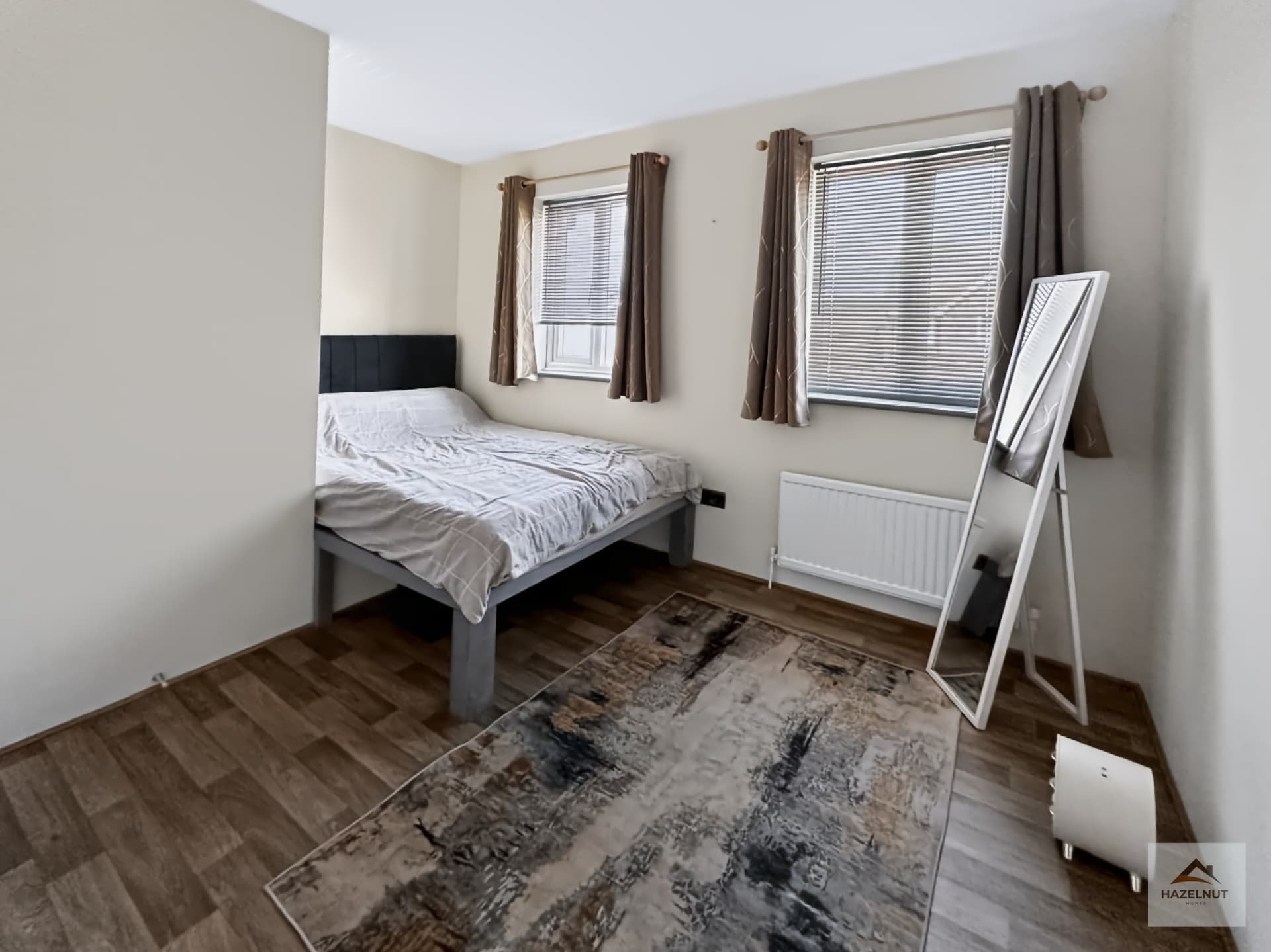 Main double bedroom with two windows at 8 Curlew Avenue